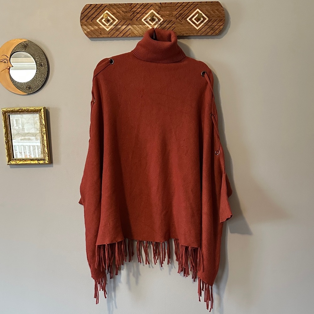 Chic Terracotta Turtleneck Sweater with Fringe